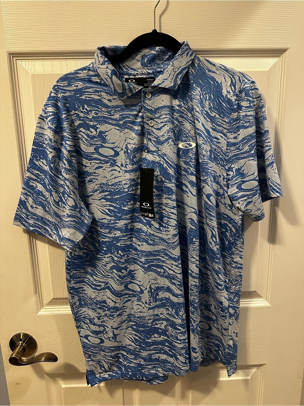 Oakley Men’s Hydrolix Polo Medium Blue White Abstract Golf Shirt NWT
